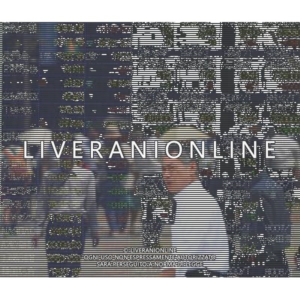 (110810) -- TOKYO, Aug. 10, 2011 () -- A man walks past an electrical board showing the Nikkei stock information in Tokyo, Aug. 10, 2011. Japanese stocks rebounded Wednesday morning, lifted by an overnight rally in the U.S. stocks after previous sell-offs. After rising more than 2 percent, the benchmark 225-issue Nikkei Stock Average finished the morning at 9,047.05, up 102.57 points, or 1.15 percent, from Tuesday. (/Kenichiro Seki) (zx)