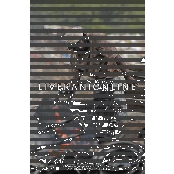 (110811) -- PANAMA CITY, Aug. 11, 2011 () -- A man looks for recyclable materials at the National Landfill located on the outskirts of Panama City, capital of Panama, Aug. 10, 2011. Residents in Kuna Nega, a squatter settlement, lack basic services and use garbage as a means of survival. (/Mauricio Valenzuela) (py)