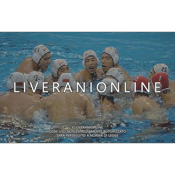 (110811) SHENZHEN, Aug. 11, 2011 Players of China react during the group A preliminary match of men\'s waterpolo against Turkey at the 26th Summer Universiade in Shenzhen, a city of south China\'s Guangdong Province, Aug. 11, 2011. China won 14 7. (/Lin Yiguang)(lm)