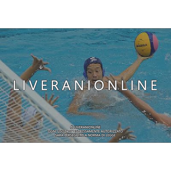 (110811) SHENZHEN, Aug. 11, 2011 Yuki Kadono of Japan shoots during the group D preliminary match of men\'s waterpolo against Hungary at the 26th Summer Universiade in Shenzhen, a city of south China\'s Guangdong Province, Aug. 11, 2011. Japan won 13 10. (/Lin Yiguang)(lm)