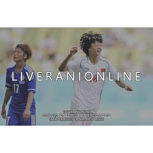 (110811) SHENZHEN, Aug. 11, 2011 Li Dongna (R) of China celebrates for her goal during the group A preliminary match of women\'s football against Chinese Taipei at the 26th Summer Universiade in Shenzhen, a city of south China\'s Guangdong Province, Aug. 11, 2011. China won 2 0. (/Wang Haofei)(lm)