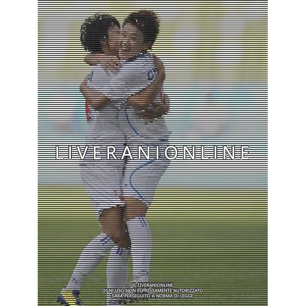 (110811) SHENZHEN, Aug. 11, 2011 Pang Fengyue (R) of China celebrates her goal with her teammate during the group A preliminary match of women\'s football against Chinese Taipei at the 26th Summer Universiade in Shenzhen, a city of south China\'s Guangdong Province, Aug. 11, 2011. China won 2 0. (/Wang Haofei)(lm)