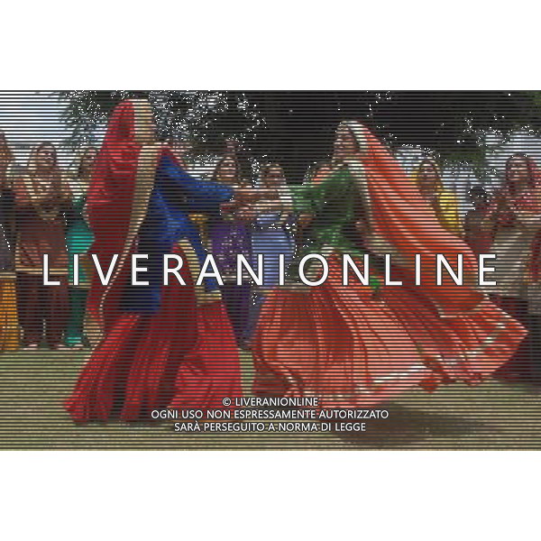 (110810) -- AMRITSAR, Aug. 10, 2011 () -- Indian college girls perform a Punjabi folk dance to celebrate the Teej Festival in Amritsar, India, Aug. 10, 2011. Teej marks the advent of the monsoon and also commemorates Hindu Goddess Parvati \'s union with Shiva. (/Stringer) (wjd)