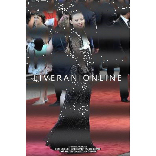 Olivia Wilde walks the red carpet at the Cowboys Vs Alien Premiere at the O2 Arena London - Image Copyright Ben Pruchnie Photographer B3968