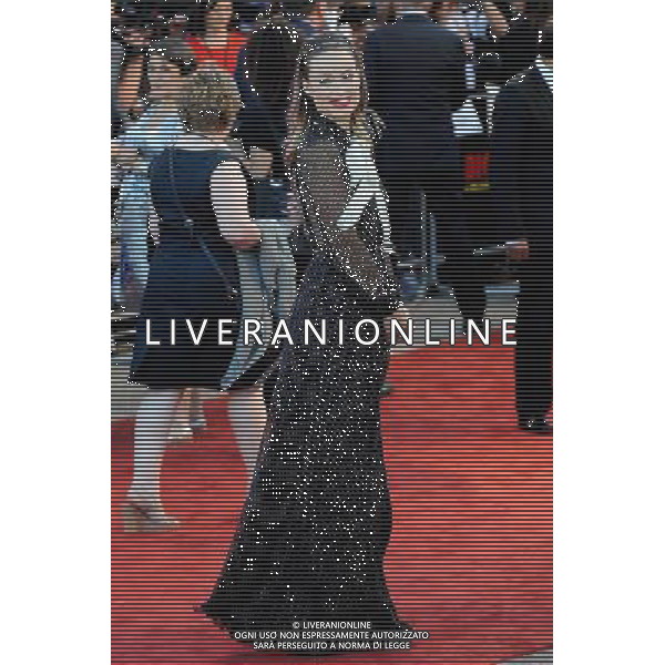 Olivia Wilde walks the red carpet at the Cowboys Vs Alien Premiere at the O2 Arena London - Image Copyright Ben Pruchnie Photographer B3968