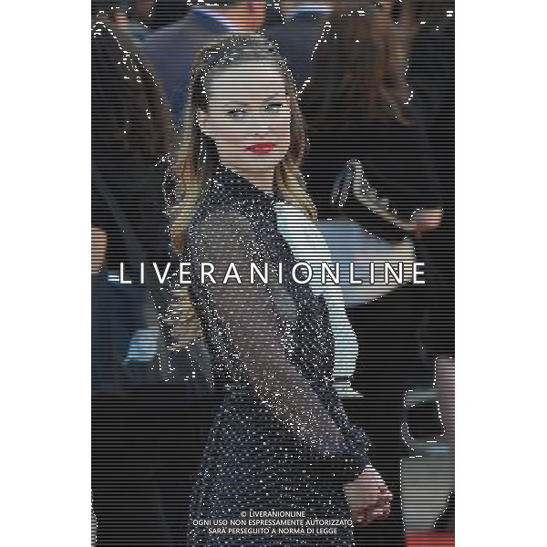 Olivia Wilde walks the red carpet at the Cowboys Vs Alien Premiere at the O2 Arena London - Image Copyright Ben Pruchnie Photographer B3968