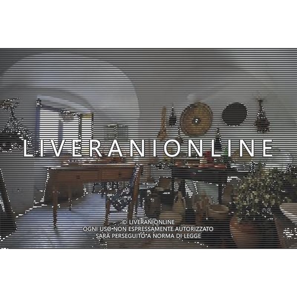 (110812) ALBEROBELLO, Aug. 12, 2011 Photo taken on Aug. 10, 2011 shows an exhibition of the traditional life inside a Trulli at a Trulli Museum in Alberobello, southern Italy. Alberobello, the city of drystone dwellings known as trulli, is an exceptional example of vernacular architecture. The trulli are made of roughly worked limestone boulders collected from neighbouring fields. Characteristically, they feature pyramidal, domed or conical roofs built up of corbelled limestone slabs. UNESCO inscribed the Trulli of Alberobello in the World Heritage List in 1996. (/Wang Qingqin)