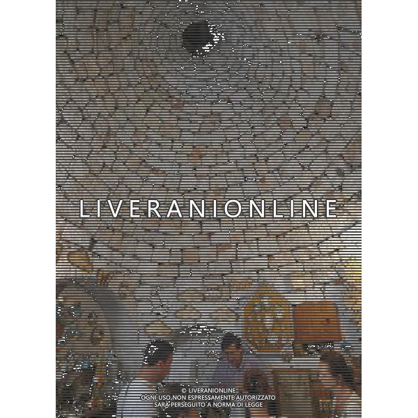 (110812) ALBEROBELLO, Aug. 12, 2011 Photo taken on Aug. 10, 2011 shows the interior view of a Trulli in Alberobello, southern Italy. Alberobello, the city of drystone dwellings known as trulli, is an exceptional example of vernacular architecture. The trulli are made of roughly worked limestone boulders collected from neighbouring fields. Characteristically, they feature pyramidal, domed or conical roofs built up of corbelled limestone slabs. UNESCO inscribed the Trulli of Alberobello in the World Heritage List in 1996. (/Wang Qingqin)