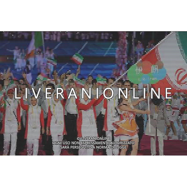 (110812)SHENZHEN, Aug. 12, 2011 Members of the Islamic Republic of Iran\'s delegation enter the site during the opening ceremony of the 26th Summer Universiade in Shenzhen, a city of south China\'s Guangdong Province, on Aug. 12, 2011. (/Guo Yong)(kh)