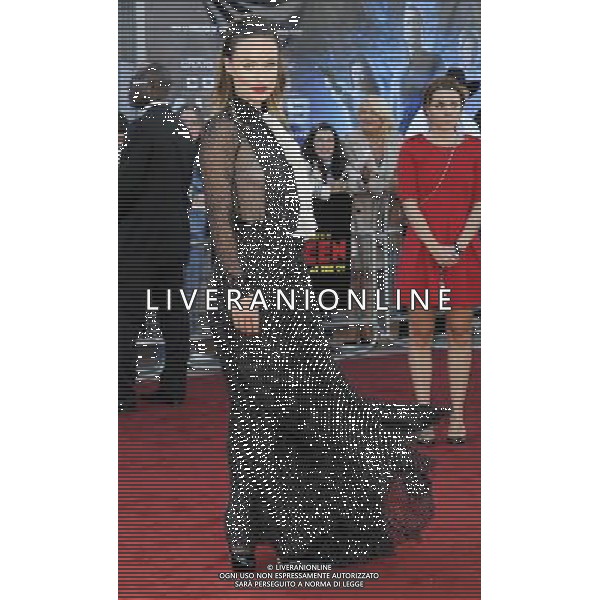 Olivia Wilde arriving at the UK premiere of \'Cowboys And Aliens\' at the O2 Arena, North Greenwich, London 11 August 2011. Picture by Can Nguyen/LFI