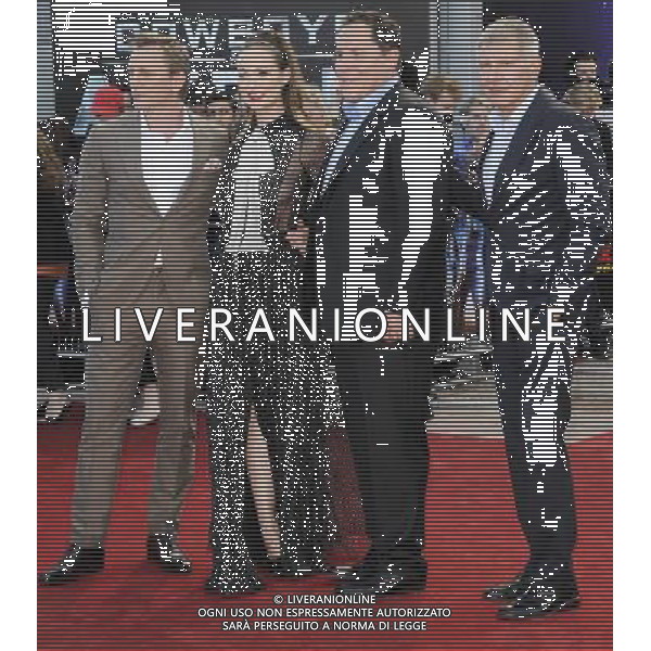 Daniel Craig,Olivia Wilde, Jon Favreau and Harrison Ford arrive at the UK premiere of \'Cowboys And Aliens\' at the O2 Arena, North Greenwich, London 11 August 2011. Picture by Can Nguyen/LFI