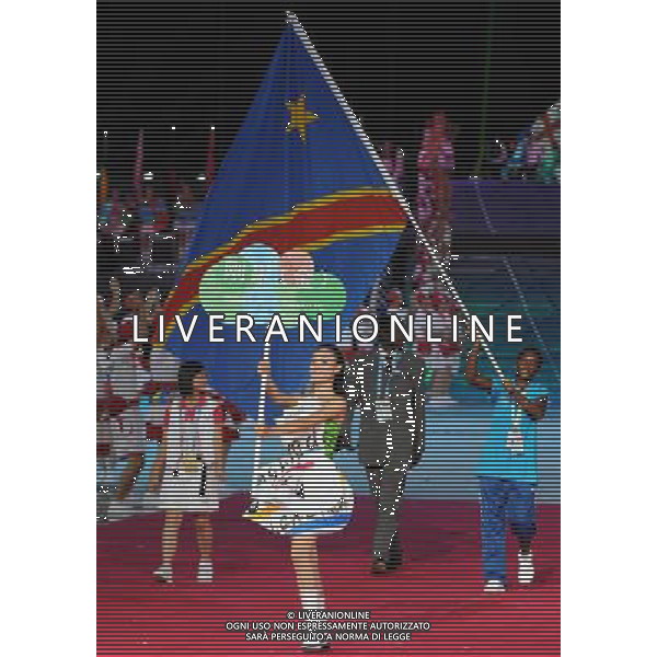 (110812)SHENZHEN, Aug. 12, 2011 Members of the Democratic Republic of Congo\'s delegation enter the site during the opening ceremony of the 26th Summer Universiade in Shenzhen, a city of south China\'s Guangdong Province, on Aug. 12, 2011. (/Yang Shiyao)(kh)