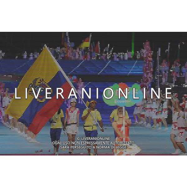 (110812)SHENZHEN, Aug. 12, 2011 Members of Ecuador\'s delegation enter the site during the opening ceremony of the 26th Summer Universiade in Shenzhen, a city of south China\'s Guangdong Province, on Aug. 12, 2011. (/Guo Yong)(kh)
