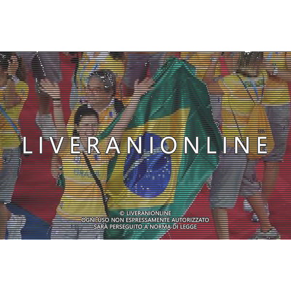 (110812)SHENZHEN, Aug. 12, 2011 Members of Brazil\'s delegation enter the site during the opening ceremony of the 26th Summer Universiade in Shenzhen, a city of south China\'s Guangdong Province, on Aug. 12, 2011. (/Lui Siu Wai)(kh)