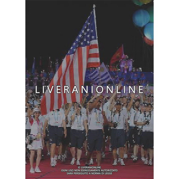 (110812) -- SHENZHEN, Aug. 12, 2011 () -- Members of the United States\'s delegation enter the site during the opening ceremony of the 26th Summer Universiade in Shenzhen, a city of south China\'s Guangdong Province, on Aug. 12, 2011. (/Yang Shiyao)(kh)