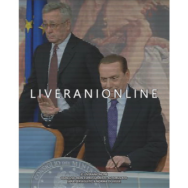 (110812) -- ROME, Aug. 12, 2011 () -- Italian Prime Minister Silvio Berlusconi (R) and Minister of Economy and Finance Giulio Tremonti attend a press conference after a cabinet meeting on financial situation in Rome, Italy, Aug. 12, 2011. The Italian cabinet approved a 45.5 billion euro (about 64.8 billion U.S. dollars) austerity program Friday evening for the upcoming two years in a bid to meet budgetary requirements by the European Central Bank (ECB) and reassure markets. (/Wang Qingqin)