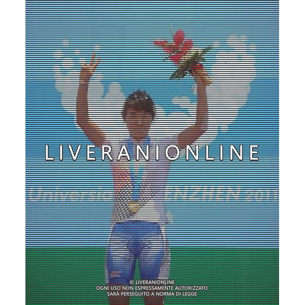 (110813) -- SHENZHEN, Aug. 13, 2011 () -- Gu Sungeun of South korea reacts during the awarding ceremony for women\'s 120 km cycling road race at the 26th Summer Universiade in Shenzhen, a city of south China\'s Guangdong Province, Aug. 13, 2011. Gu Sungeun claimed the title of the event with 3 hours 31 minutes and 42 seconds. (/Li Ga)(kh)