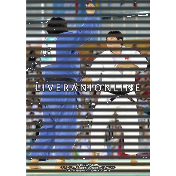 (110813) -- SHENZHEN, Aug. 13, 2011 () -- China\'s Qin Qian (R) fights with South Korea\'s Kim Na Young during their women\'s Judo +78 KG final match at the 26th Summer Universiade in Shenzhen, a city of south China\'s Guangdong Province, Aug. 13, 2011. Qin defeated Kim and got the first gold medal of Chinese delegation. (/Liu Dawei)(bxf)