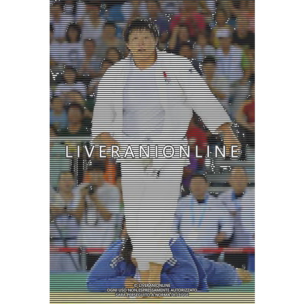 (110813) -- SHENZHEN, Aug. 13, 2011 () -- China\'s Qin Qian reacts during women\'s Judo +78 KG final against South Korea\'s Kim Na Young at the 26th Summer Universiade in Shenzhen, a city of south China\'s Guangdong Province, Aug. 13, 2011. Qin defeated Kim and got the first gold medal of Chinese delegation. (/Liu Dawei)(bxf)