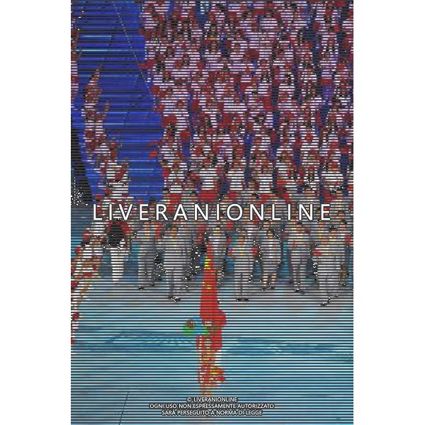 (110812) -- SHENZHEN, Aug. 12, 2011 () -- Members of China\'s delegation enter the site during the opening ceremony of the 26th Summer Universiade in Shenzhen, a city of south China\'s Guangdong Province, on Aug. 12, 2011. (/Chen Yehua)(kh)
