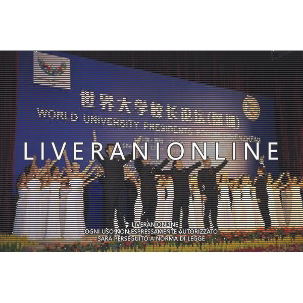 (110813) -- SHENZHEN, Aug. 13, 2011 () -- The chorus performs during the opening ceremony of the World University Presidents Forum in Shenzhen, a city of south China\'s Guangdong Province, Aug. 13, 2011. Responding to the 26th Summer Universiade, the World University Presidents Forum started on Saturday with participation of some 200 university presidents from about 100 countries and regions exchanging views on the theme of \'the new mission and talents cultivating in 21st century\'. (/Liang Xu)(lm)