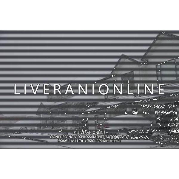 WELLINGTON , Aug. 15, 2011 Houses and car are covered with snow in the northern suburb of Wellington, capital of New Zealand, on Aug. 14. A heavy snowfall hit Wellington on Sunday. (/Huang Xingwei) (zwx)