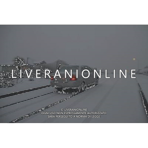 WELLINGTON , Aug. 15, 2011 A car runs on a snow covered road in the northern suburb of Wellington, capital of New Zealand, on Aug. 14. A heavy snowfall hit Wellington on Sunday. (/Huang Xingwei) (zwx)