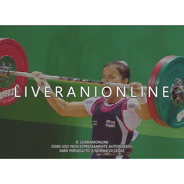 (110814) -- SHENZHEN, Aug. 14, 2011 () -- Pramsiri Bunphithak of Thailand competes during the women\'s 53KG weightlifting at the 26th Summer Universiade in Shenzhen, a city of south China\'s Guangdong Province, Aug. 14, 2011. Bunphithak got the bronze medal with 205KG. (/Wang Song) (bxf)