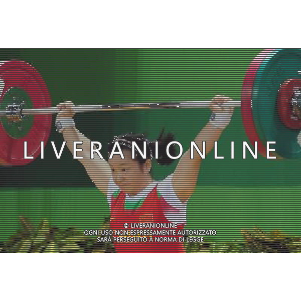 (110814) -- SHENZHEN, Aug. 14, 2011 () -- Ji Jing of China competes during the women\'s 53kg weightlifting competition at the 26th Summer Universiade in Shenzhen, a city of south China\'s Guangdong Province, Aug. 14, 2011. Ji Jing claimed the title of the event with a total of 222kg. (/Wang Song)