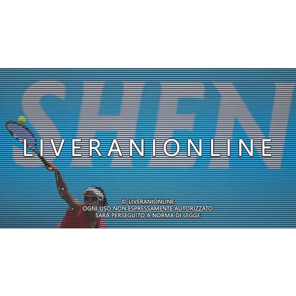 (110814) -- SHENZHEN, Aug. 14, 2011 () -- Ayu Kade Dwi Fani Damayanti of Indonesia serves to Yan Zhen of China during their women\'s singles first round match of tennis at the 26th Summer Universiade in Shenzhen, a city of south China\'s Guangdong Province, Aug. 14, 2011. Ayu Kade Dwi Fani Damayanti won 2-0. (/Li Ming) £®bxf£©