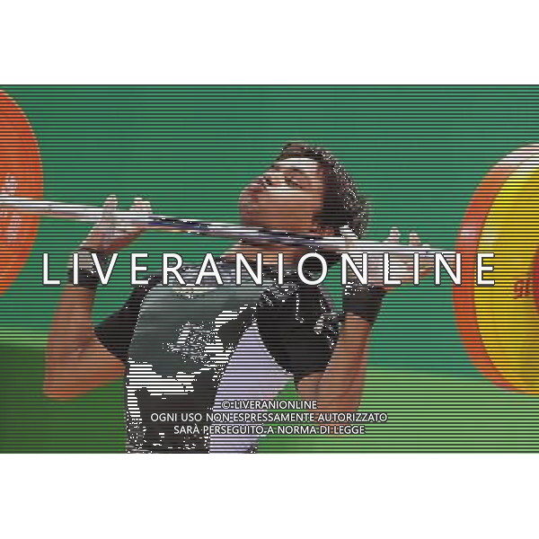 (110814) -- SHENZHEN, Aug. 14, 2011 () -- Imran Ismail of Pakistan competes during the men\'s 56KG weightlifting at the 26th Summer Universiade in Shenzhen, a city of south China\'s Guangdong Province, Aug. 13, 2011. (/Wang Song) (bxf)