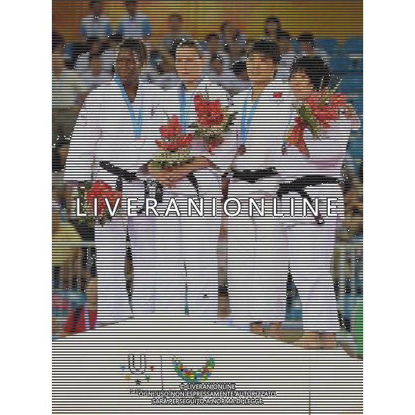 (110813) -- SHENZHEN, Aug. 13, 2011 () -- Viktoriia Turks (2nd L) of Ukraine, Geraldine Mentouopou (1st L) of France, Zhang Jie (2nd R) of China and Jeong Gyeong Mi of South Korea react during the awarding ceremony of the women\'s 78kg judo match in Shenzhen, a city of south China\'s Guangdong Province, Aug. 13, 2011. Viktoriia Turks won the gold and Geraldine Mentouopou won the silver. Zhang Jie and Jeong Gyeong Mi won the bronze. (/Liu Dawei)(lm)