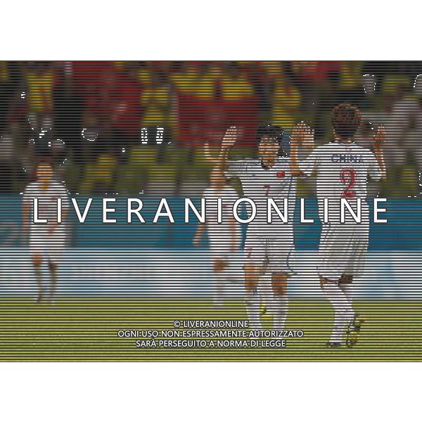 (110813) -- SHENZHEN, Aug. 13, 2011 () -- Bi Yan (2nd R), captain of China, celebrates with her teammate Zhao Lili (1st R) after the group A women\'s football match against Canada at the 26th Summer Universiade in Shenzhen, a city of south China\'s Guangdong Province, Aug. 13, 2011. China won 1-0. (/Liao Yujie)(lm)