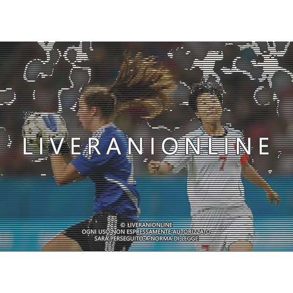 (110813) -- SHENZHEN, Aug. 13, 2011 () -- Bi Yan (R) of China reacts during the group A women\'s football match against Canada at the 26th Summer Universiade in Shenzhen, a city of south China\'s Guangdong Province, Aug. 13, 2011. China won 1-0. (/Liao Yujie)(lm)