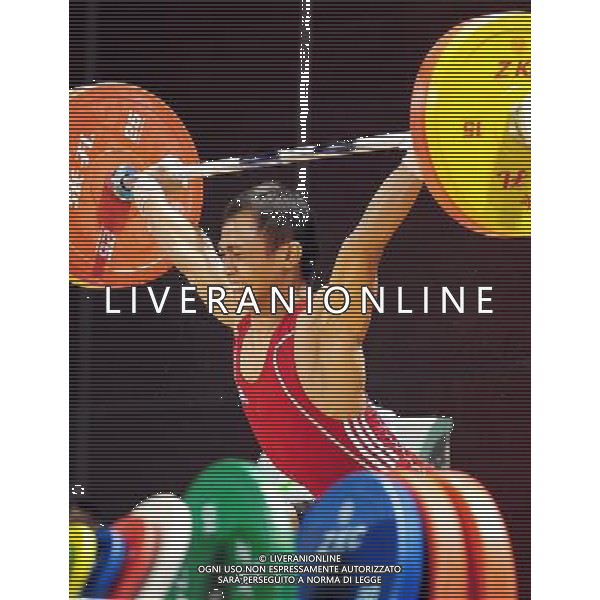 (110813) -- SHENZHEN, Aug. 13, 2011 () -- Surahmat bin Suwoto Wijoyo of Indonesia competes during the men\'s 56kg weightlifting competition at the 26th Summer Universiade in Shenzhen, a city of south China\'s Guangdong Province, Aug. 13, 2011. Surahmat bin Suwoto Wijoyo won the silver of the event with a total of 239kg. (/Wang Song)