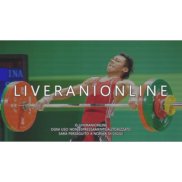(110813) -- SHENZHEN, Aug. 13, 2011 () -- Surahmat bin Suwoto Wijoyo of Indonesia competes during the men\'s 56kg weightlifting competition at the 26th Summer Universiade in Shenzhen, a city of south China\'s Guangdong Province, Aug. 13, 2011. Surahmat bin Suwoto Wijoyo won the silver of the event with a total of 239kg. (/Wang Song)