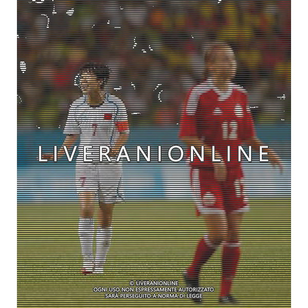 (110813) -- SHENZHEN, Aug. 13, 2011 () -- Bi Yan (L) of China reacts during the group A women\'s football match against Canada at the 26th Summer Universiade in Shenzhen, a city of south China\'s Guangdong Province, Aug. 13, 2011. China won 1-0. (/Liao Yujie)(lm)