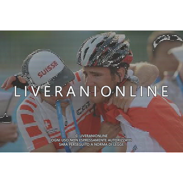 (110813) -- SHENZHEN, Aug. 13, 2011 () -- Bernhard Oberholzer (R) of Switzerland reacts after winning the men\'s 160km cycling road race at the 26th Summer Universiade in Shenzhen, a city of south China\'s Guangdong Province, Aug. 13, 2011. Bernhard Oberholzer claimed the champion with 3 hours 50 minutes and 22 seconds. (/Li Ga)(lm)