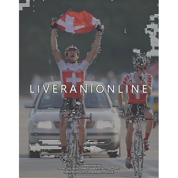 (110813) -- SHENZHEN, Aug. 13, 2011 () -- Bernhard Oberholzer (L) of Switzerland celebrates as his teammate Patrick Schelling reacts after the men\'s 160km cycling road race at the 26th Summer Universiade in Shenzhen, a city of south China\'s Guangdong Province, Aug. 13, 2011. Bernhard Oberholzer claimed the champion with 3 hours 50 minutes and 22 seconds. Patrick Schelling won the silver of the event. (/Li Ga)(lm)