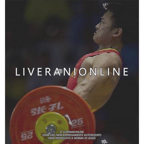(110813) -- SHENZHEN, Aug. 13, 2011 () -- Li Lizhi of China competes during the men\'s 56kg weightlifting competition at the 26th Summer Universiade in Shenzhen, a city of south China\'s Guangdong Province, Aug. 13, 2011. Li Lizhi claimed the title of the event with a total of 273kg. (/Fei Maohua)
