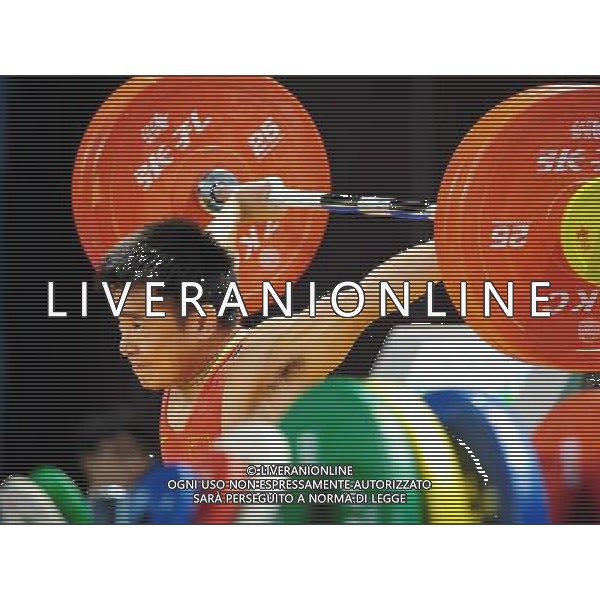 (110813) -- SHENZHEN, Aug. 13, 2011 () -- Li Lizhi of China competes during the men\'s 56kg weightlifting competition at the 26th Summer Universiade in Shenzhen, a city of south China\'s Guangdong Province, Aug. 13, 2011. Li Lizhi claimed the title of the event with a total of 273kg. (/Wang Song)