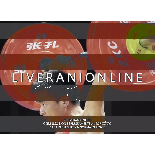 (110813) -- SHENZHEN, Aug. 13, 2011 () -- Li Lizhi of China competes during the men\'s 56kg weightlifting competition at the 26th Summer Universiade in Shenzhen, a city of south China\'s Guangdong Province, Aug. 13, 2011. Li Lizhi claimed the title of the event with a total of 273kg. (/Wang Song)