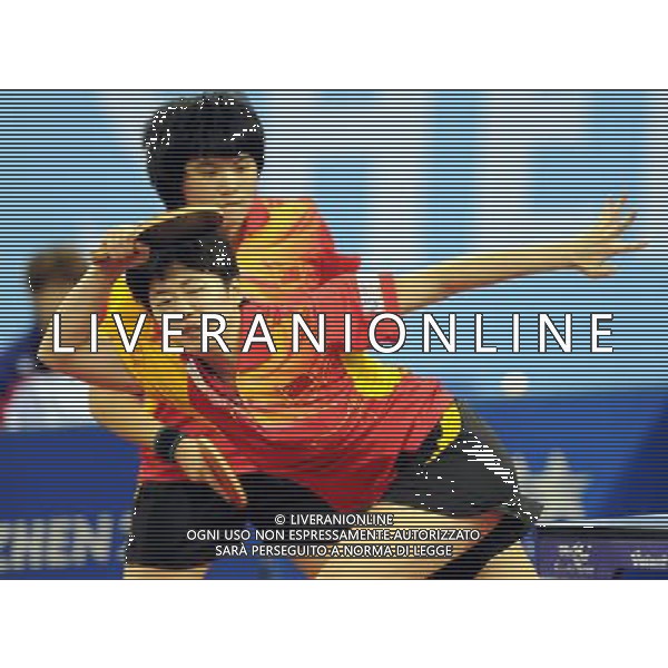 (110813) -- SHENZHEN, Aug. 13, 2011 () -- China\'s Rao Jingwen (front) and Ma Yuefei compete during the group A roundrobin of women\'s team table tennis against Lee Ichen and Cheng Iching of Chinese Taipei at the 26th Summer Universiade in Shenzhen, a city of south China\'s Guangdong Province, Aug. 13, 2011. Rao and Ma won 3-1 and China won 3-0. (/Yang Shiyao)(lm)
