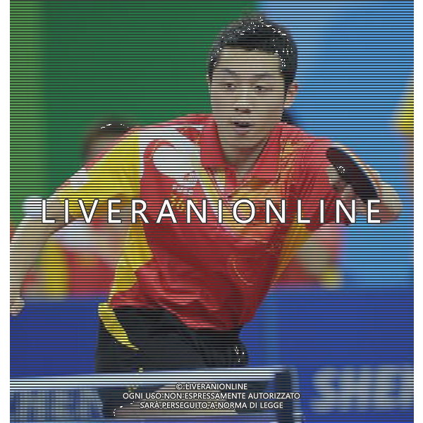 (110813) -- SHENZHEN, Aug. 13, 2011 () -- China\'s Xu Xin competes during the group A roundrobin of men\'s team table tennis against David Powell of Australia at the 26th Summer Universiade in Shenzhen, a city of south China\'s Guangdong Province, Aug. 13, 2011. Xu won 3-0 and China won 3-0. (/Yang Shiyao)(lm)