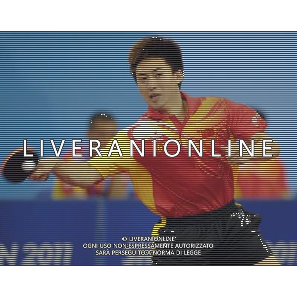 (110813) -- SHENZHEN, Aug. 13, 2011 () -- China\'s Fang Bo competes during the group A roundrobin of men\'s team table tennis against Todd Gregory of Canada at the 26th Summer Universiade in Shenzhen, a city of south China\'s Guangdong Province, Aug. 13, 2011.Fang won 3-0 and China won 3-0. (/Yang Shiyao)(lm)