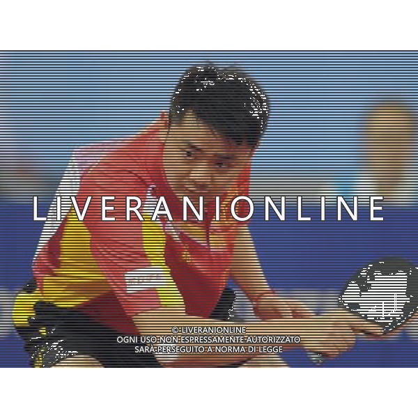 (110813) -- SHENZHEN, Aug. 13, 2011 () -- China\'s Hu Bingtao competes during the group A roundrobin of men\'s team table tennis against Tang Chi Ho of Australia at the 26th Summer Universiade in Shenzhen, a city of south China\'s Guangdong Province, Aug. 13, 2011. Hu won 3-0 and China won 3-0. (/Yang Shiyao)(lm)
