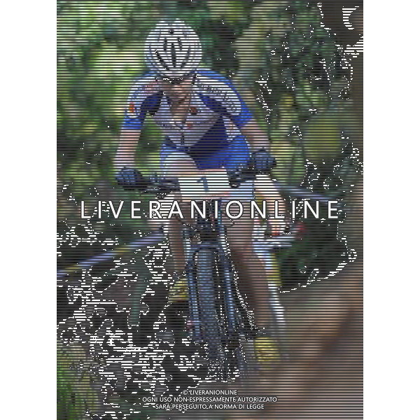 SHENZHEN, Aug. 15, 2011 Maaris Meier of Esthonia competes during the the final of women\'s MTB cross country race at the 26th Summer Universiade in Shenzhen, a city of south China\'s Guangdong Province, Aug. 15, 2011. Meier got the silver medal with 1 hour 14 minutes 11 seconds. (/Li Ga) (bxf)