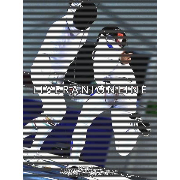 SHENZHEN, Aug. 14, 2011 Peter Szenyi (L) of Hungary competes with Virgile Marchal of France during the men\'s epee individual final at the 26th Summer Universiade in Shenzhen, a city of south China\'s Guangdong Province, Aug. 14, 2011. Peter Szenyi won the match and took the gold medal of the event. (/Wang Haofei)