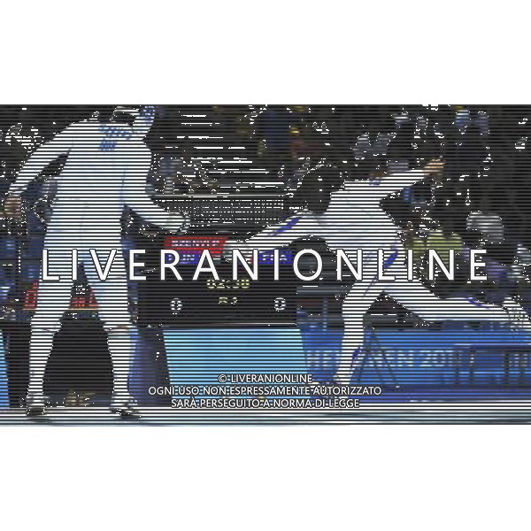 SHENZHEN, Aug. 14, 2011 Peter Szenyi (L) of Hungary competes with Virgile Marchal of France during the men\'s epee individual final at the 26th Summer Universiade in Shenzhen, a city of south China\'s Guangdong Province, Aug. 14, 2011. Peter Szenyi won the match and took the gold medal of the event. (/Wang Haofei)
