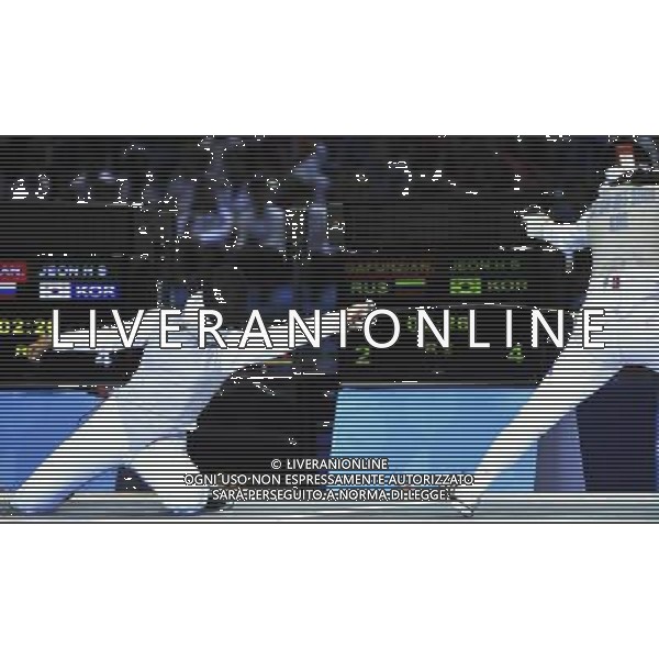 SHENZHEN, Aug. 14, 2011 Kamilla Gafurzianova (L) of Russia competes with Jeon Hee Sook of South Korea during the women\'s foil individual final at the 26th Summer Universiade in Shenzhen, a city of south China\'s Guangdong Province, Aug. 14, 2011. Kamilla Gafurzianova won the match and took the gold medal of the event. (/Wang Haofei)
